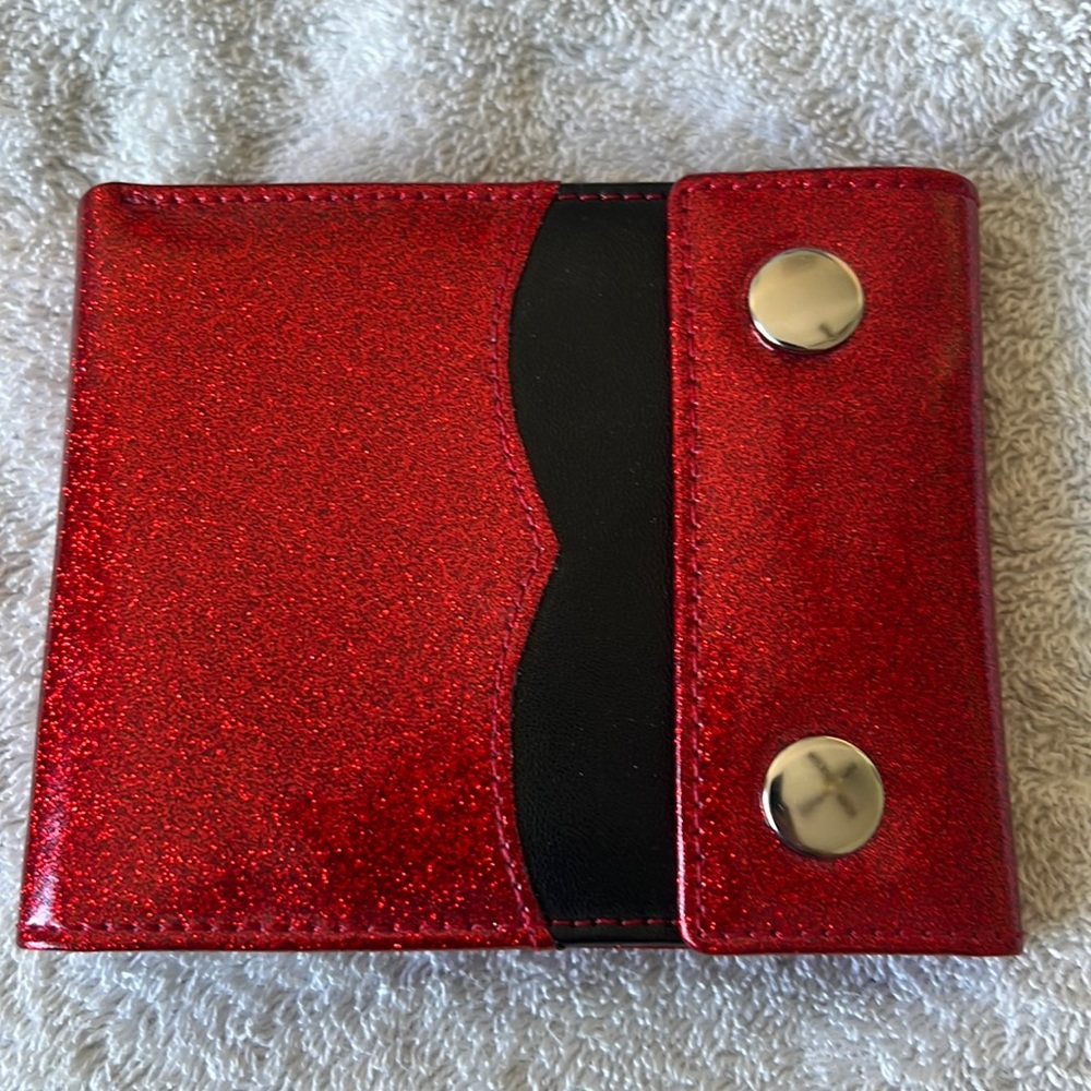 Red and black sourpuss wallet